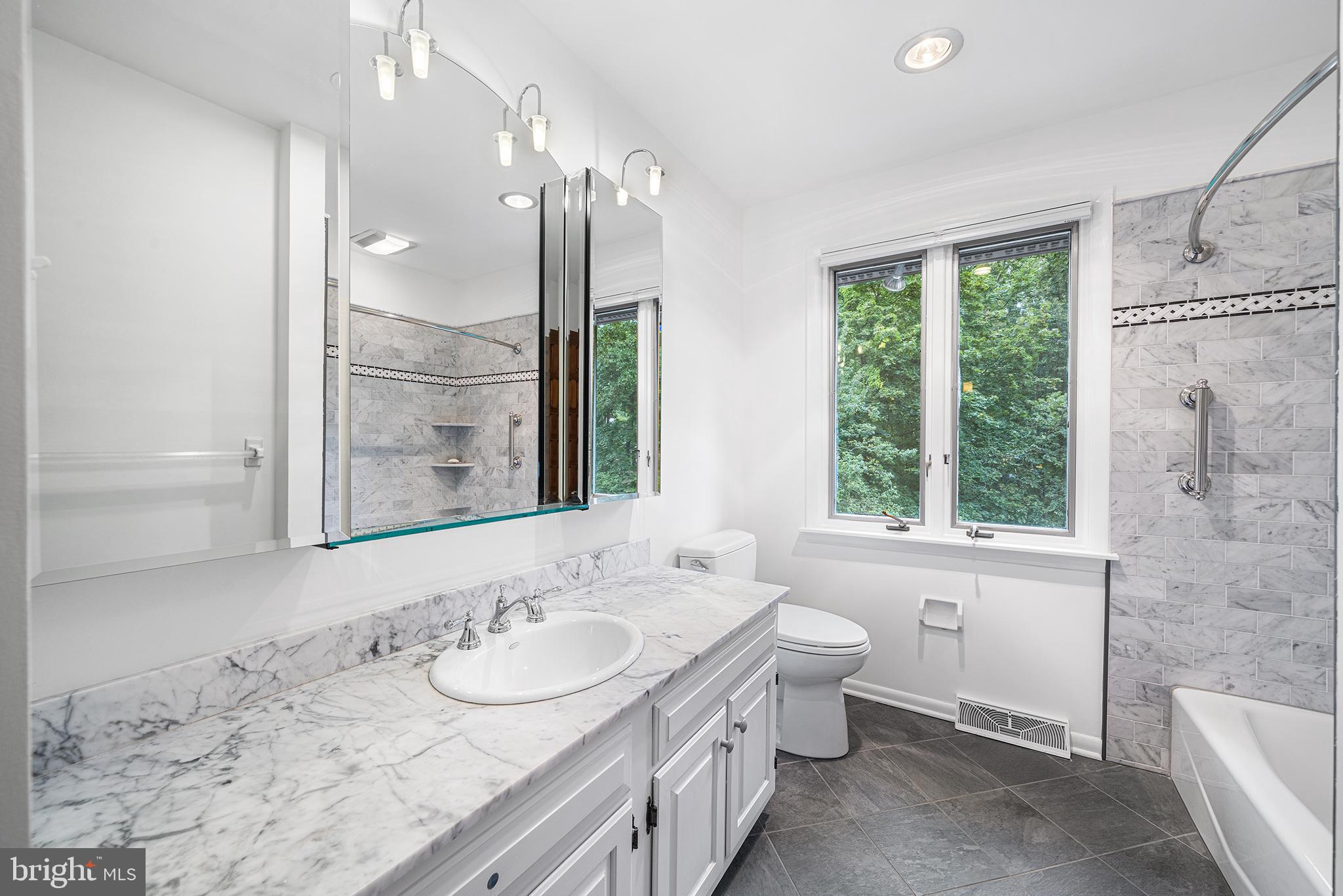 204 French Road Newtown Square, PA 19073 - Photo 25 of 36 a bathroom with a granite countertop sink toilet and shower