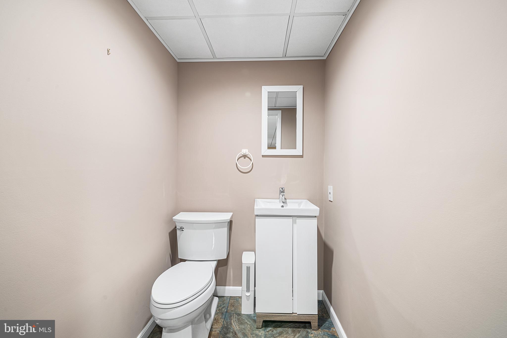 204 French Road Newtown Square, PA 19073 - Photo 29 of 36 a white toilet sitting next to a bathroom sink