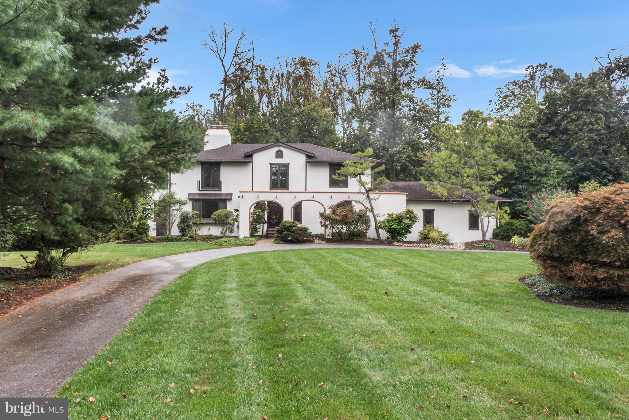 204 French Road Newtown Square, PA 19073 - Photo 34 of 36 a view of a yard in front of a house with large trees