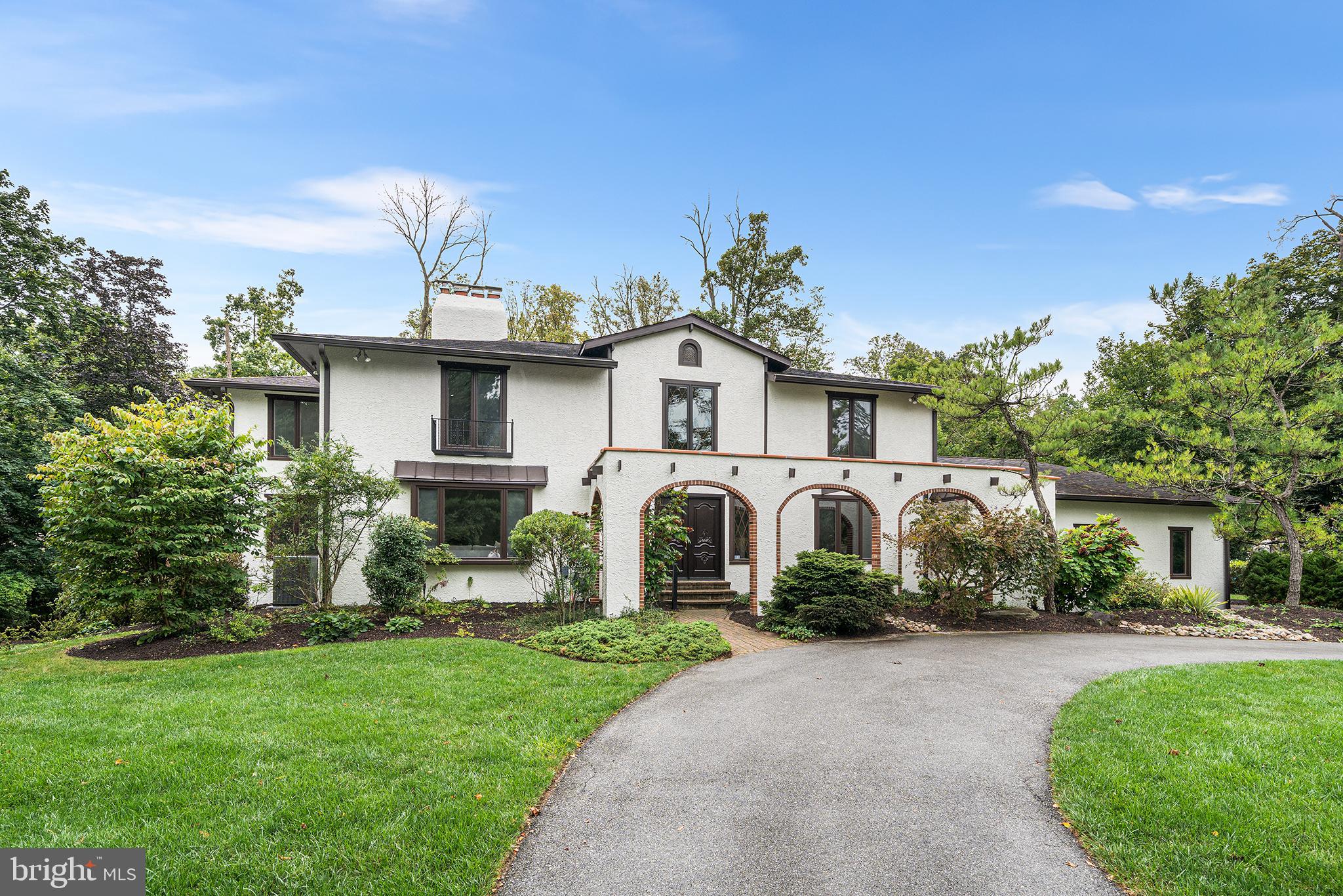 204 French Road Newtown Square, PA 19073 - Photo 35 of 36 a front view of a house with a garden