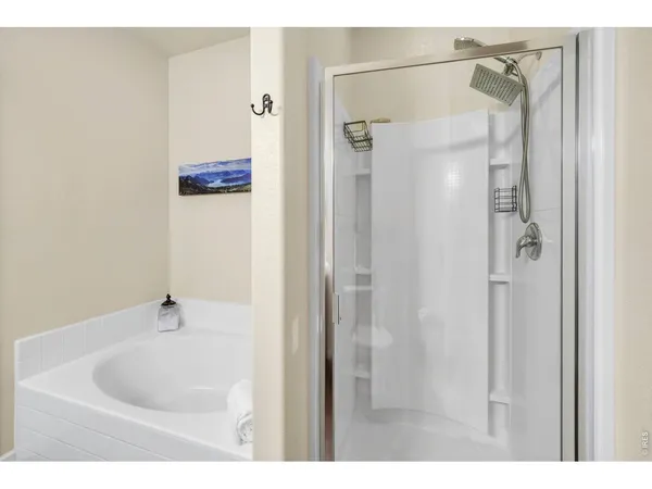 a bathroom with a white bath tub