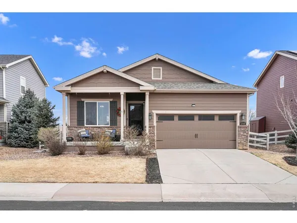 a front view of a house with yard