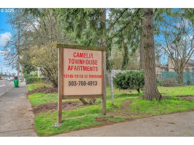 a sign on the side of the road