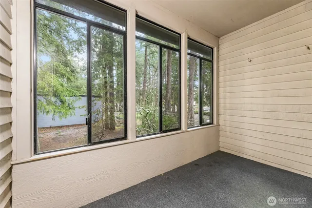 a view of a balcony with an outdoor space