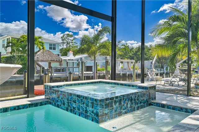 a view of swimming pool with a patio