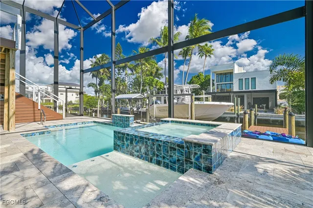 a view of a chairs and table in the patio