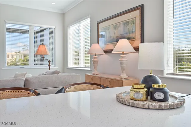 a living room with furniture and window