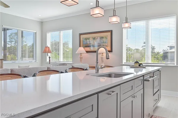 a kitchen with a sink and a window