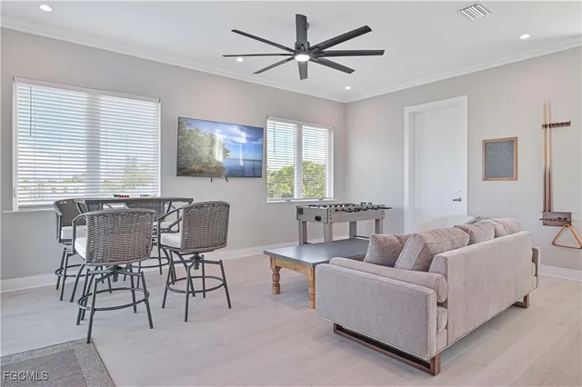 a living room with furniture and window