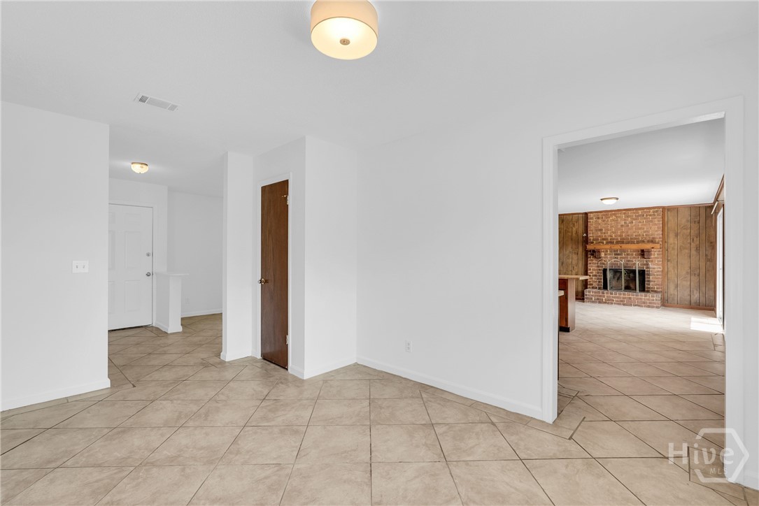 103 Hillgate Road Savannah, GA 31404 - Photo 24 of 47 Dining room with view of living room and den