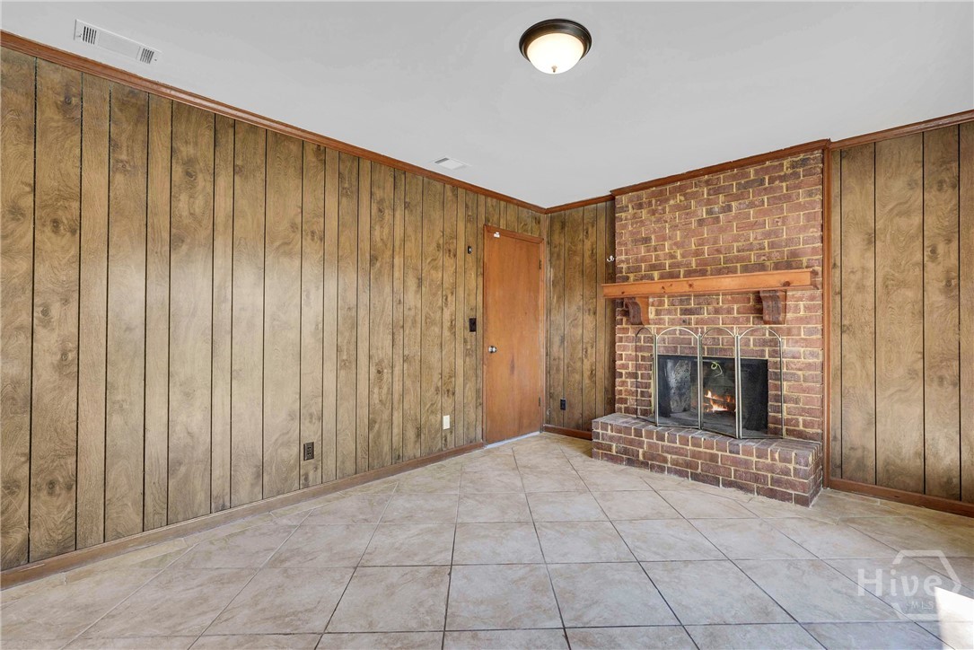 103 Hillgate Road Savannah, GA 31404 - Photo 34 of 47 Den with fireplace