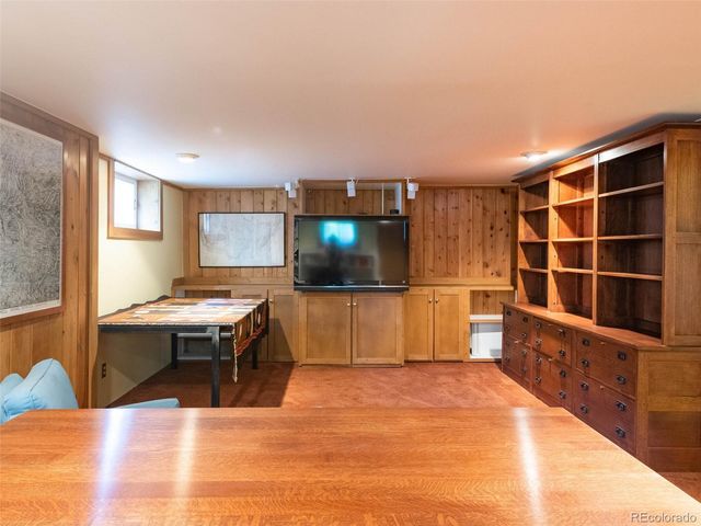 a view of a livingroom with furniture and window