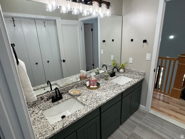 2807 North Ogden Canyon Road Eden, UT 84310 - Photo 27 of 72 Double vanity featuring granite countertops and undermount sinks