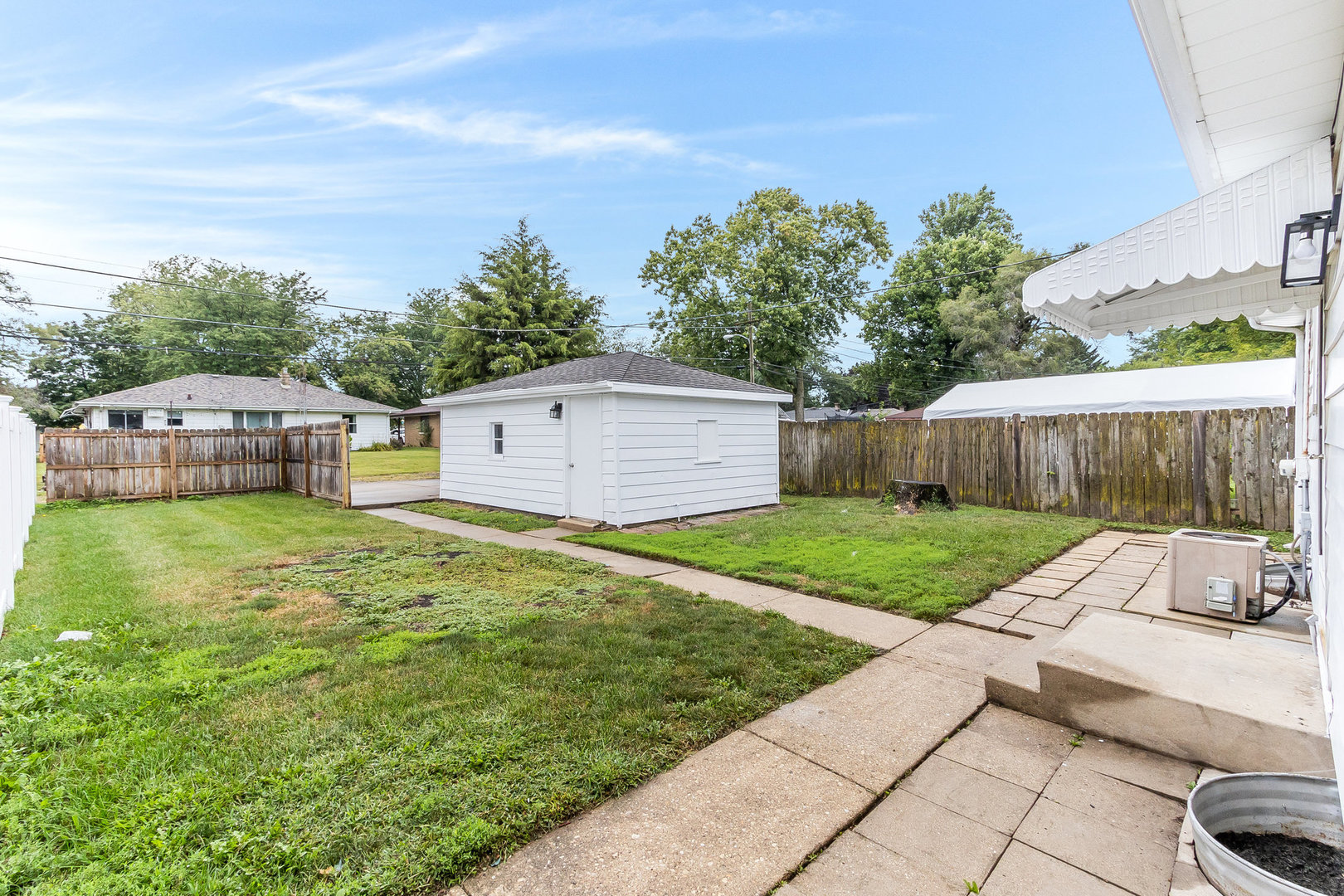 211 South Reed Street Joliet, IL 60436 - Photo 13 of 15 a view of backyard with seating and green space