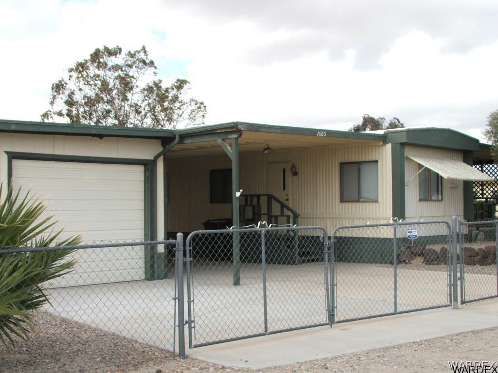 1663 East Gran Fort Mohave, AZ 86426 - Photo 1 of 34 a view of a house with a backyard