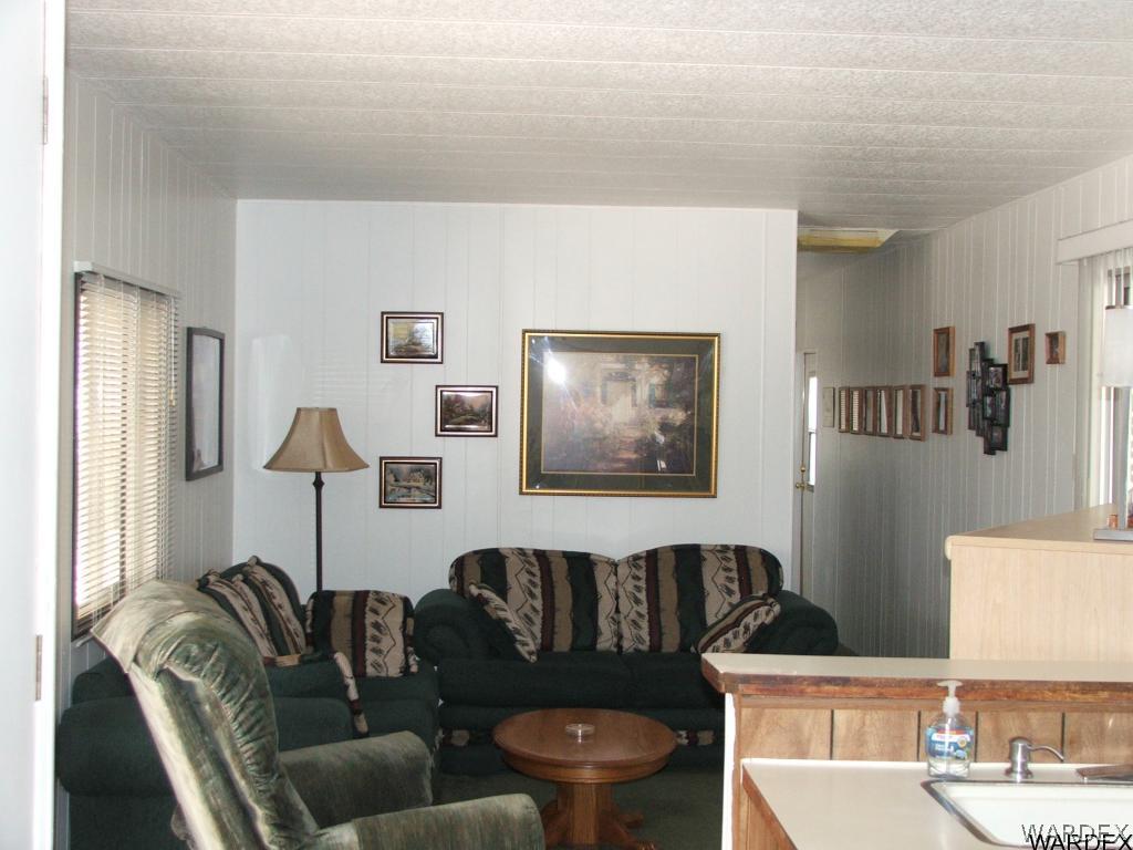 1663 East Gran Fort Mohave, AZ 86426 - Photo 12 of 34 a living room with furniture and a lamp