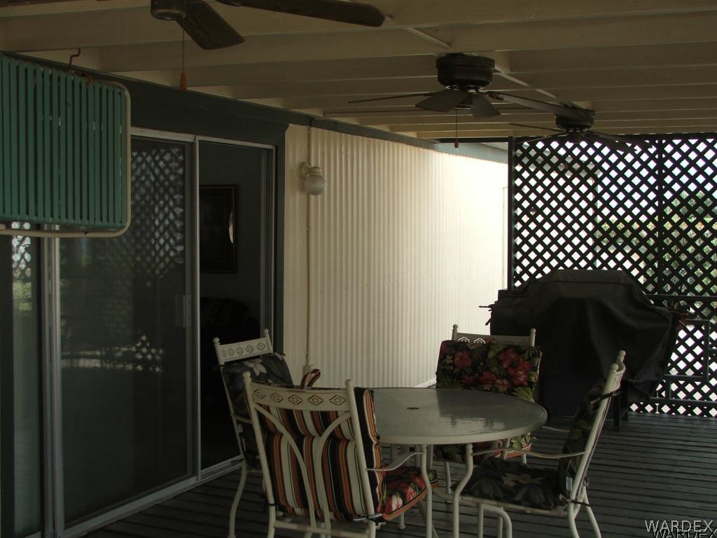 1663 East Gran Fort Mohave, AZ 86426 - Photo 24 of 34 a table and chairs in a balcony