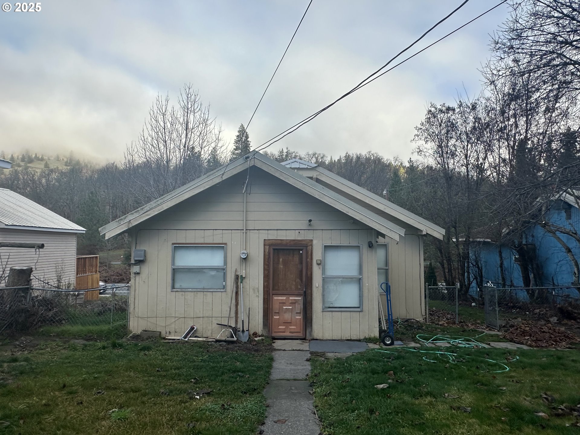 517 Main Street Klickitat, WA 98628 - Photo 14 of 41 a front view of house with yard and green space