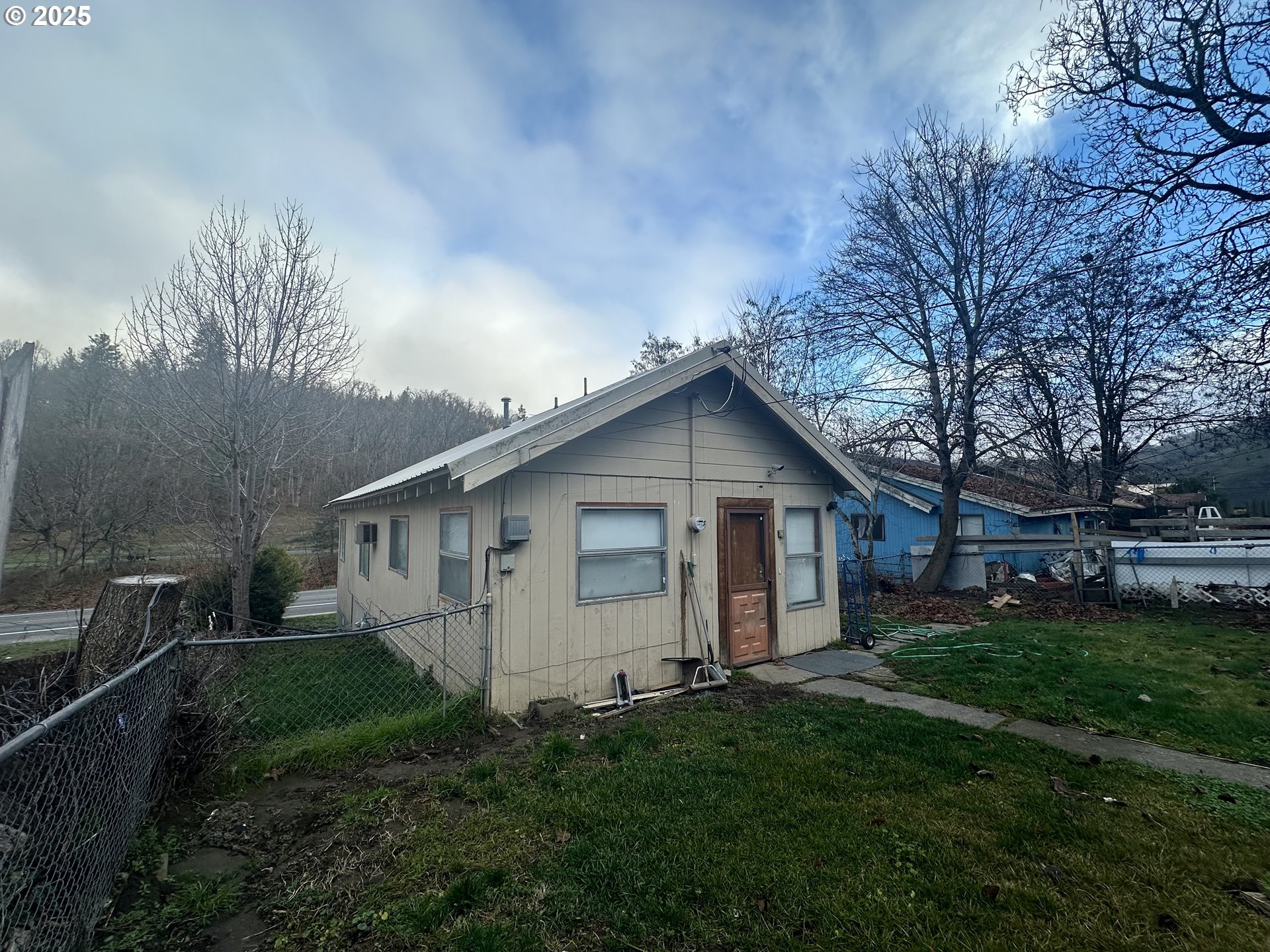 517 Main Street Klickitat, WA 98628 - Photo 15 of 41 a view of backyard of house with green space