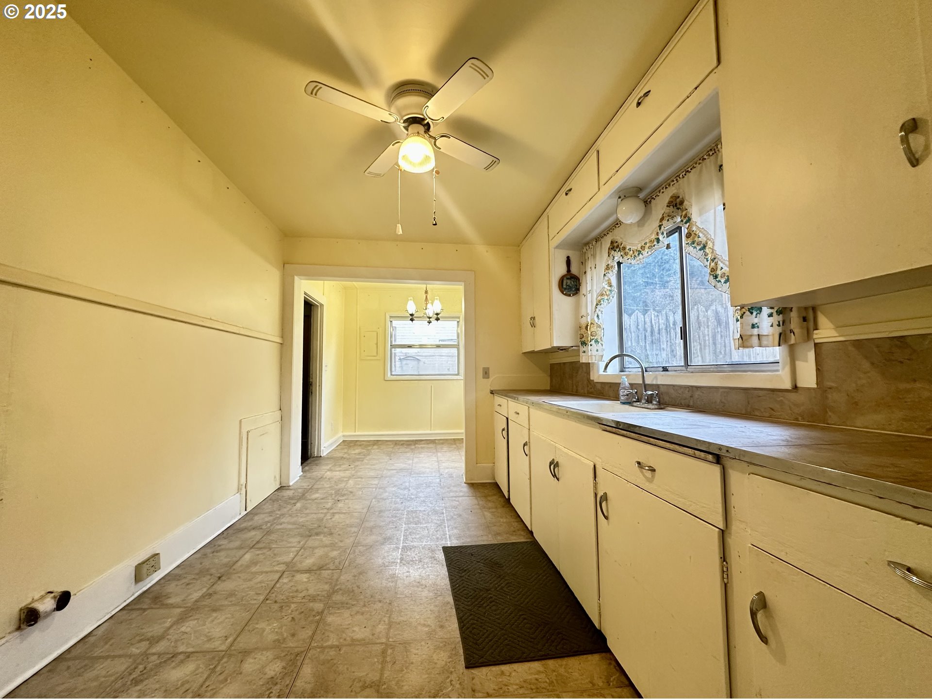517 Main Street Klickitat, WA 98628 - Photo 33 of 41 a bathroom with a sink a mirror and a shower