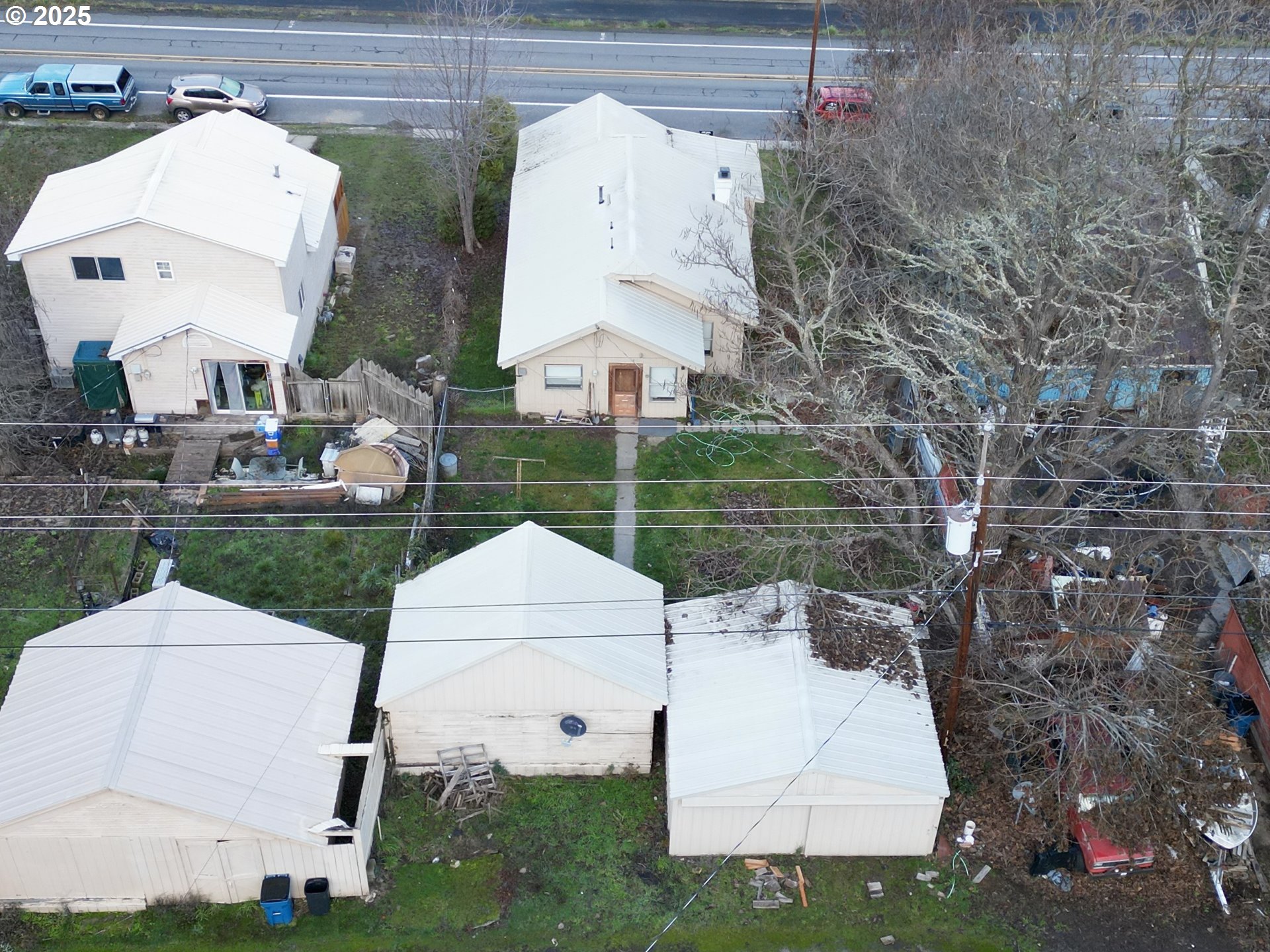 517 Main Street Klickitat, WA 98628 - Photo 4 of 41 a view of a white house with a yard and table and chairs