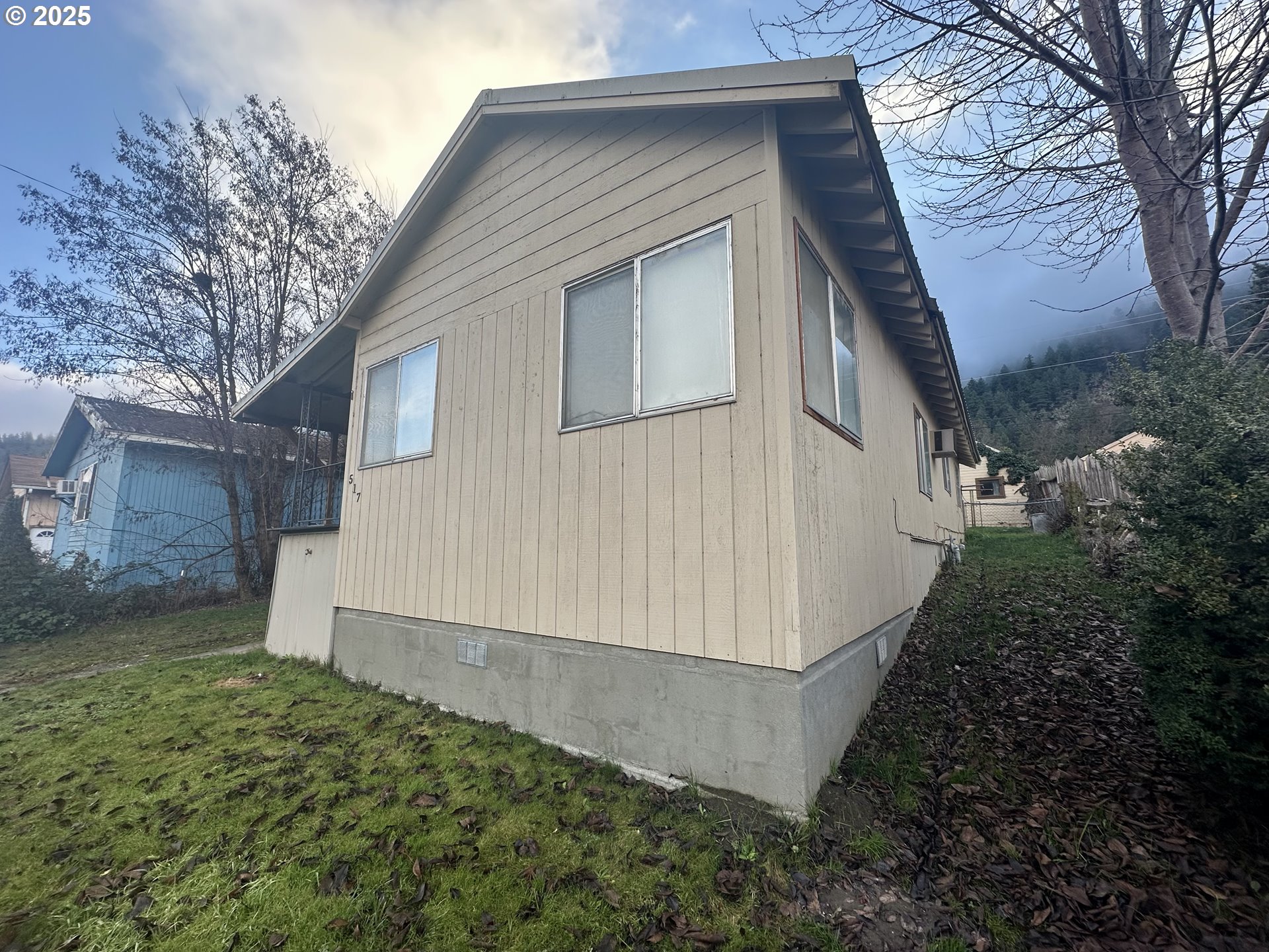 517 Main Street Klickitat, WA 98628 - Photo 6 of 41 a view of a house with a yard