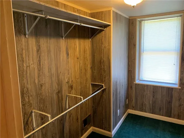 a view of balcony with wooden floor