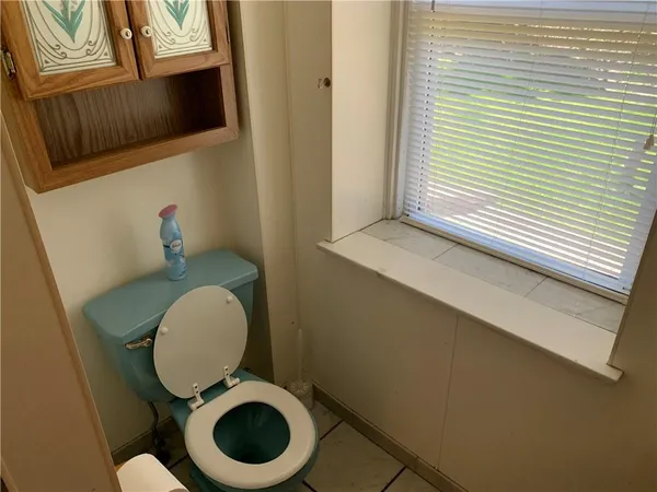 a bathroom with a toilet