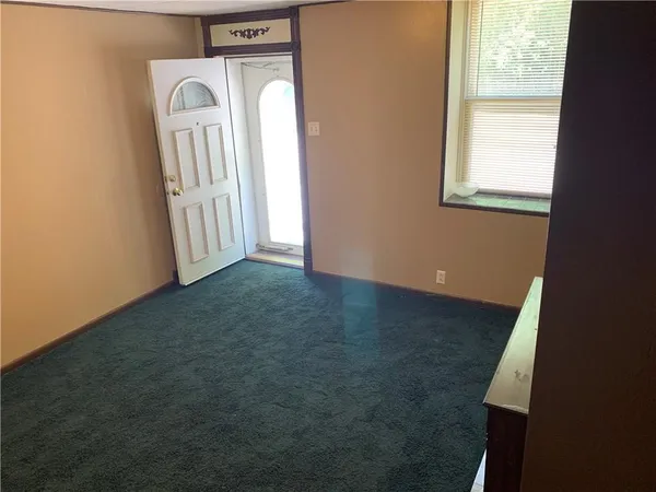 a view of a room with front door