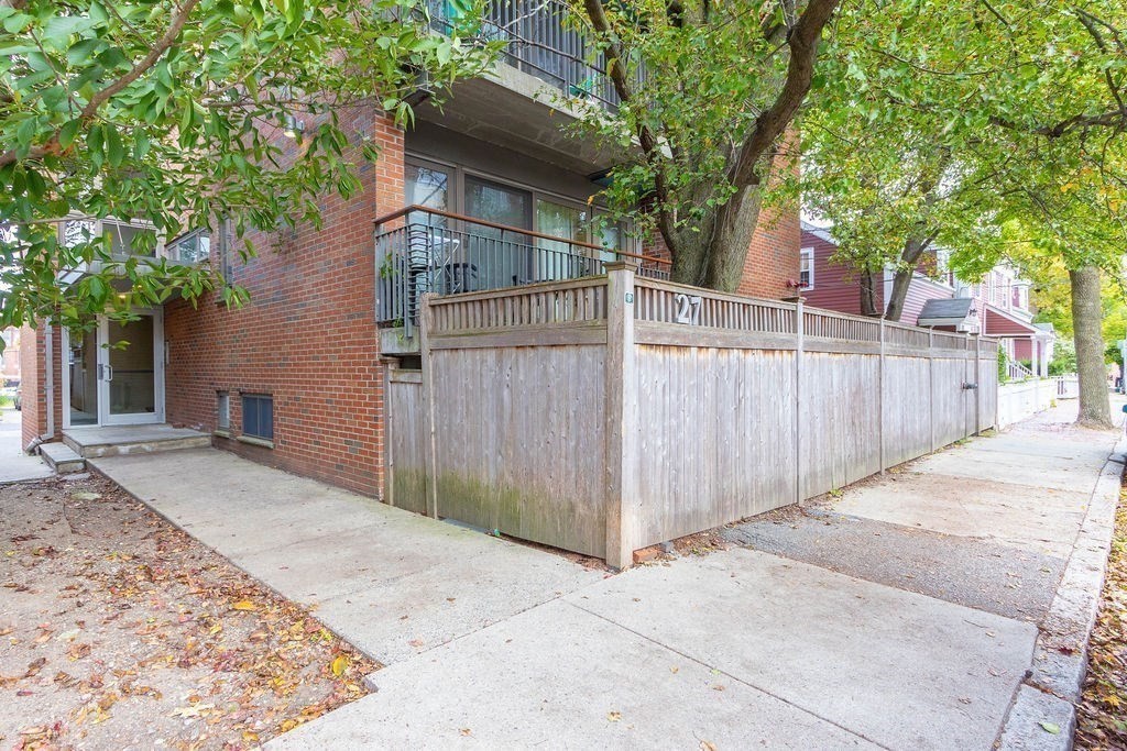 27 West Street, Unit 1 Cambridge, MA 02139 - Photo 22 of 26 a view of a entrance gate of a house