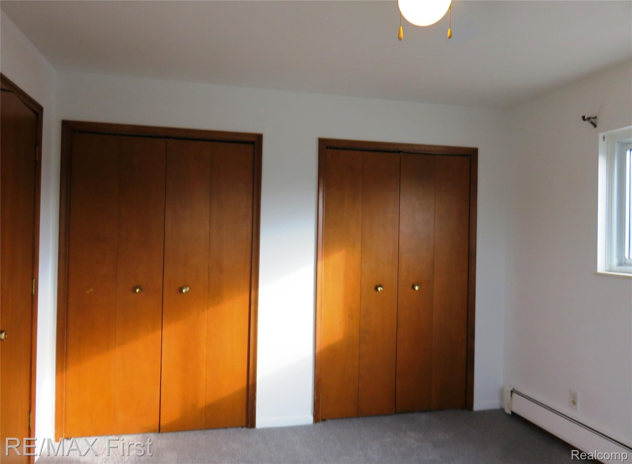 15219 East 9 Mile Road, Unit 8A Eastpointe, MI 48021 - Photo 8 of 8 15219 9 MILE 8A DOUBLE CLOSETS.JPG