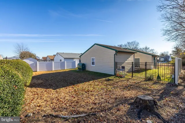 a house view with a backyard space