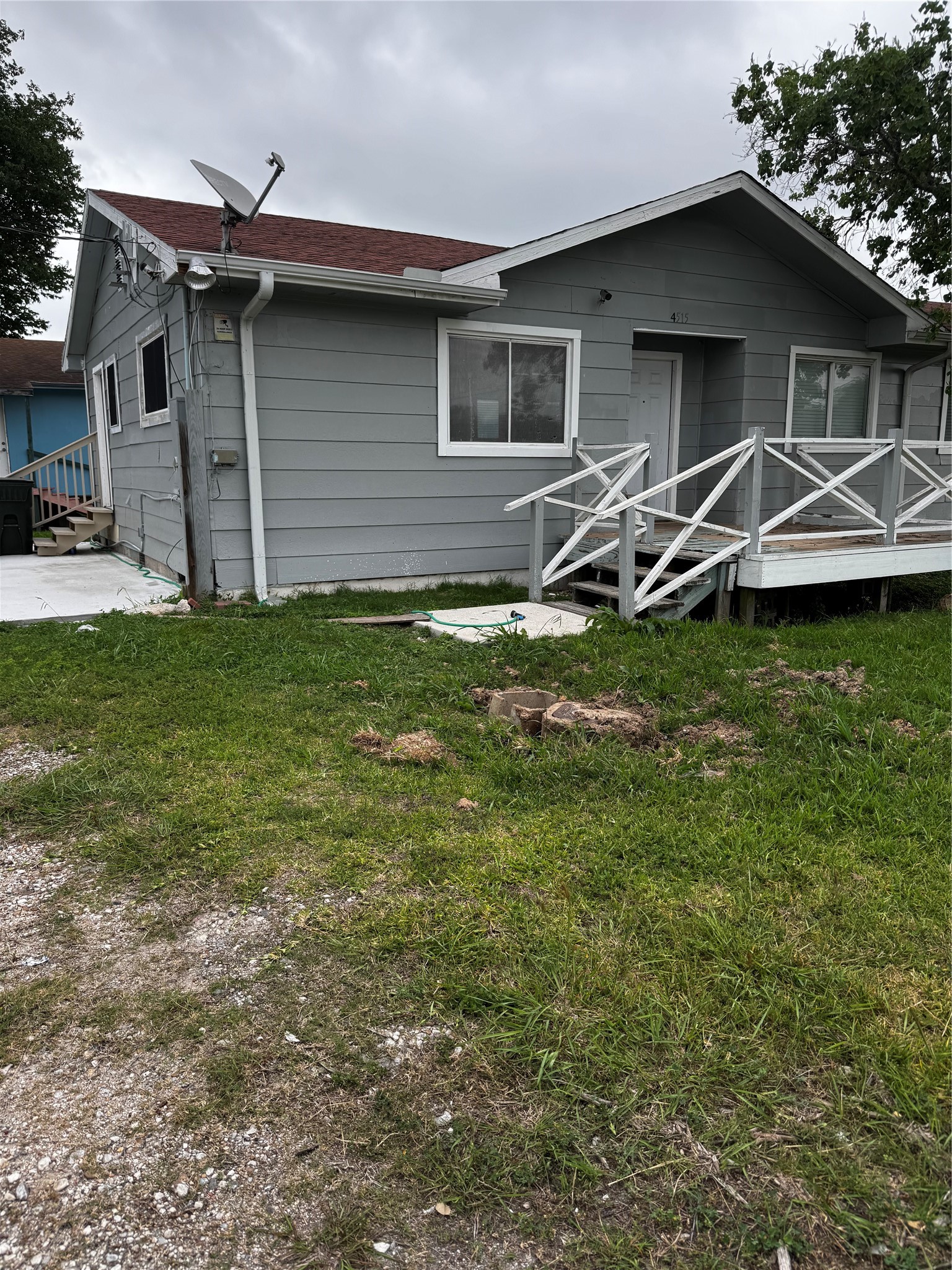 4515 7th Street Bacliff, TX 77518 - Photo 3 of 15 a front view of a house with garden