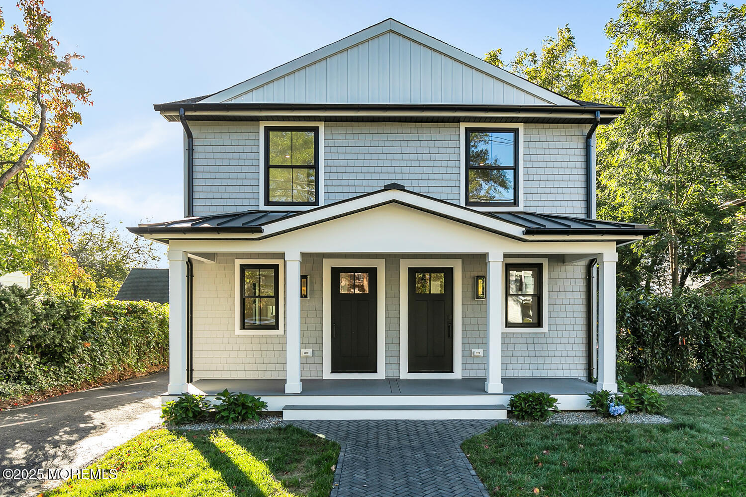 516 River Road Fair Haven, NJ 07704 - Photo 1 of 62 a front view of a house with garden