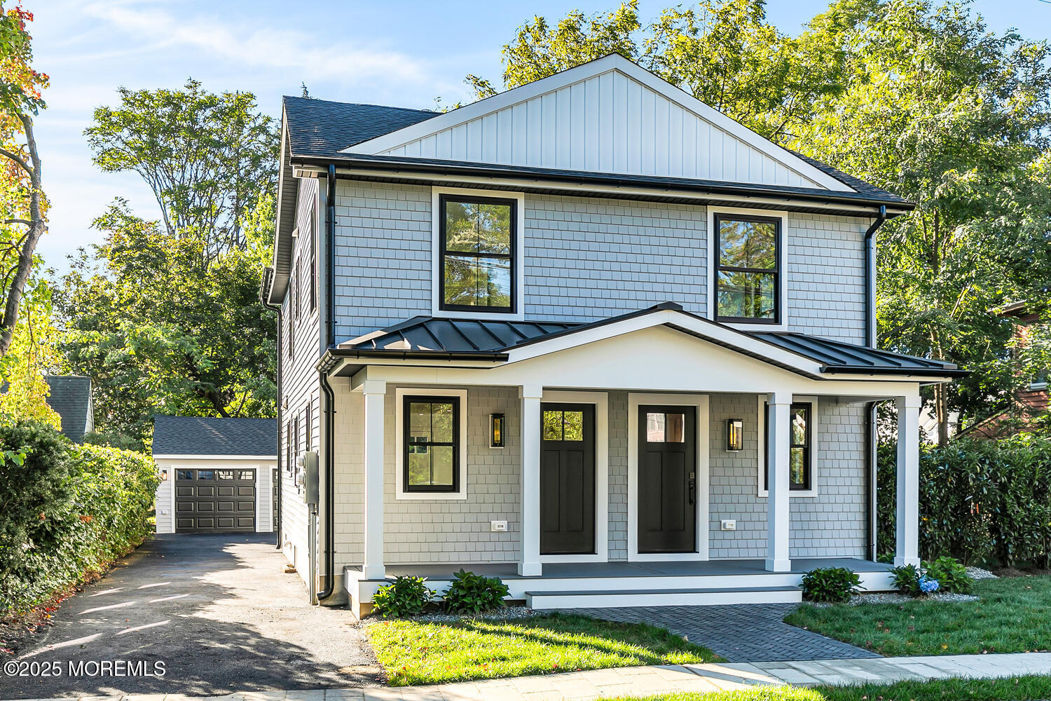 516 River Road Fair Haven, NJ 07704 - Photo 2 of 62 a front view of a house with a yard
