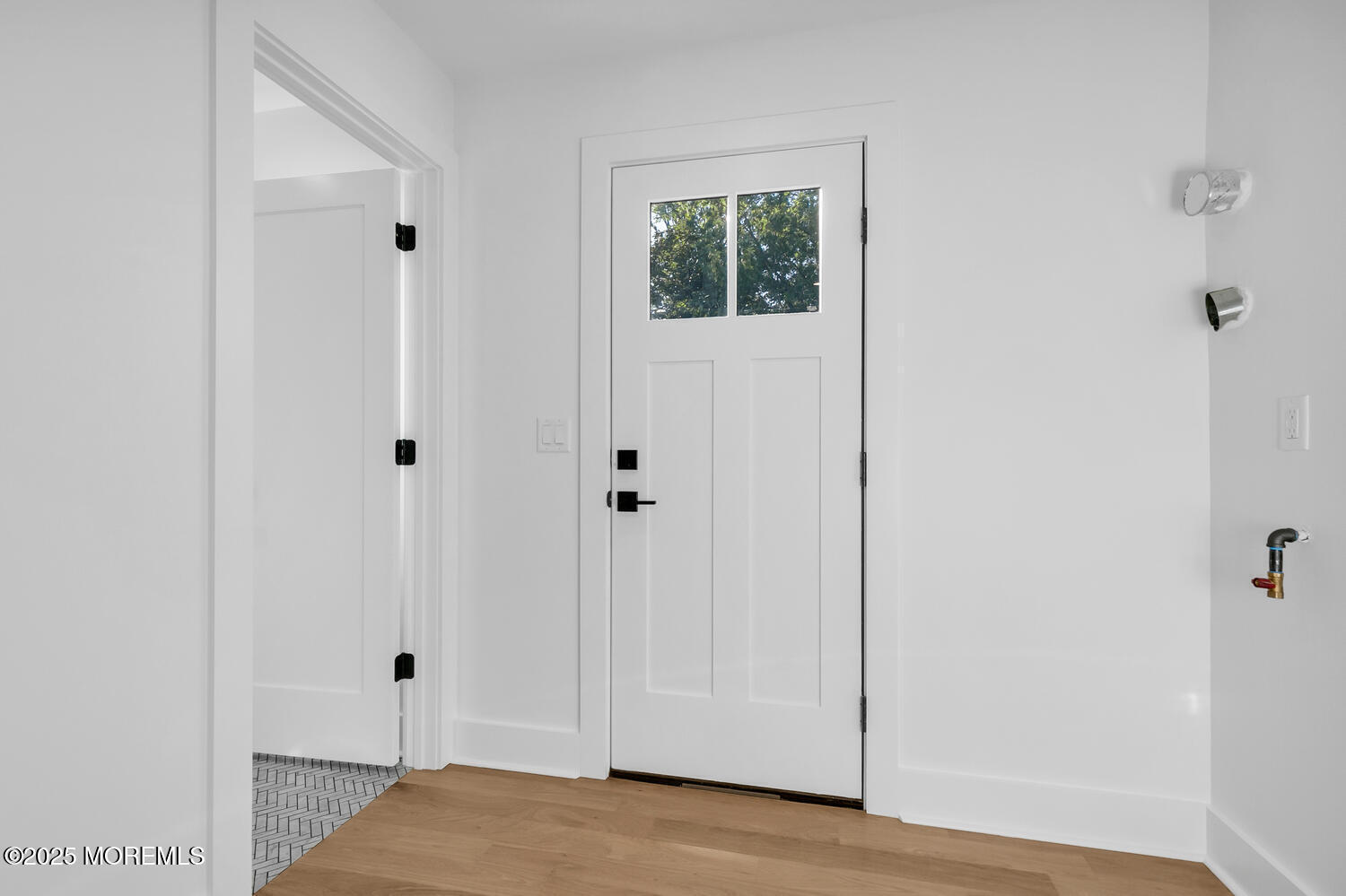 516 River Road Fair Haven, NJ 07704 - Photo 25 of 62 a view of a bedroom with wooden floor and closet