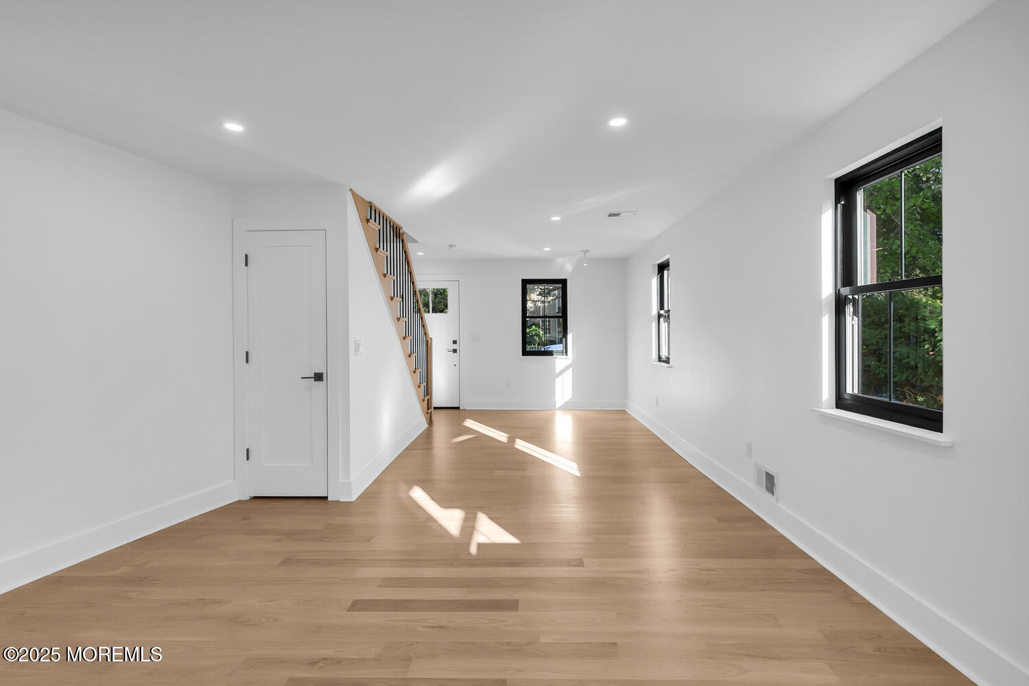 516 River Road Fair Haven, NJ 07704 - Photo 29 of 62 a view of livingroom with hardwood floor and hallway