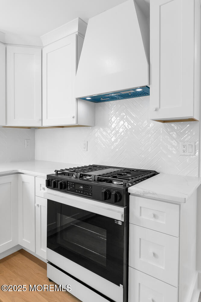 516 River Road Fair Haven, NJ 07704 - Photo 33 of 62 a stove top oven sitting inside of a kitchen