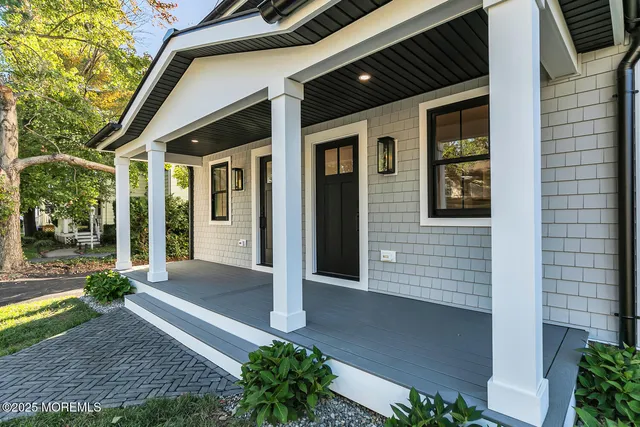 a front view of a house with a porch