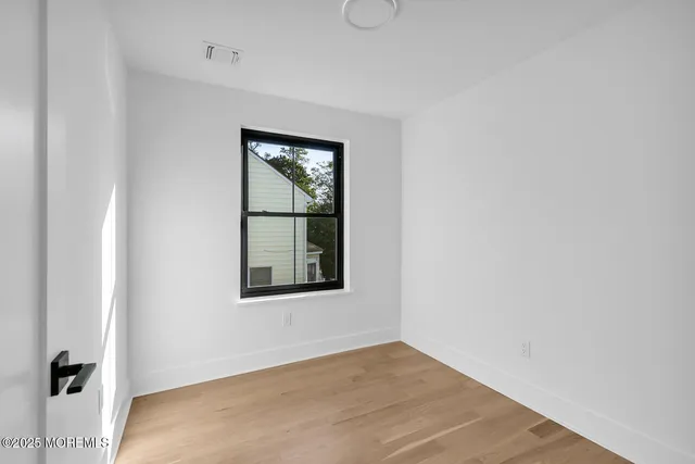 a view of a yard in front of house