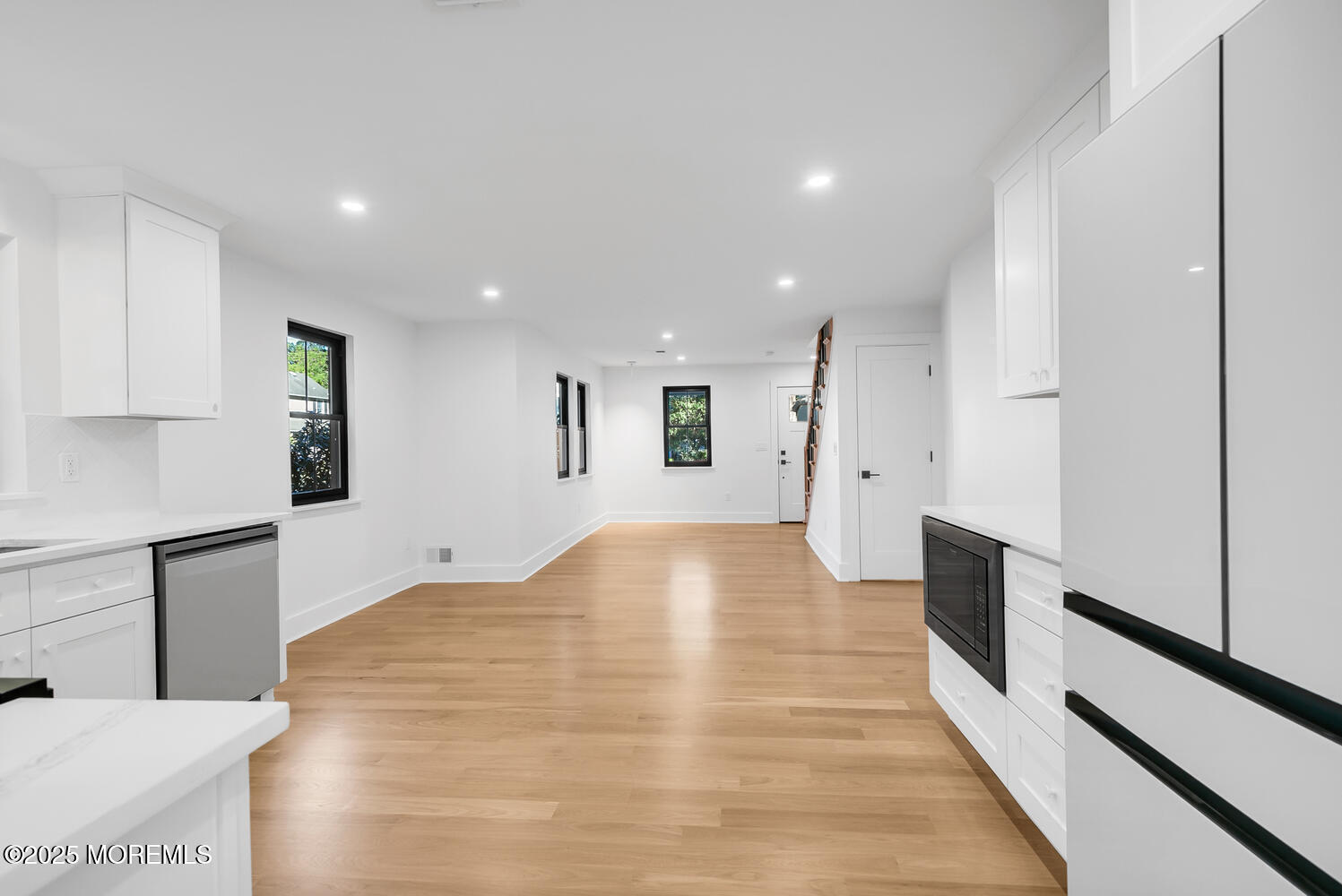 516 River Road Fair Haven, NJ 07704 - Photo 6 of 62 a view of kitchen with cabinets and wooden floor