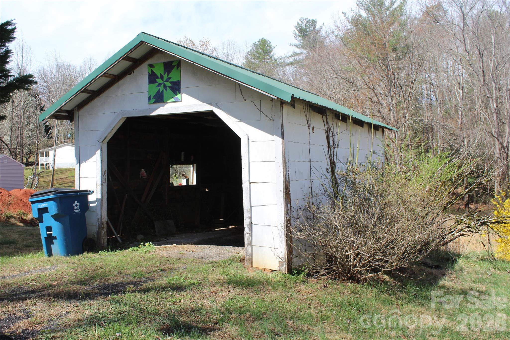 113 Williams Street Morganton, NC 28655 - Photo 18 of 20 a front view of a house with garden