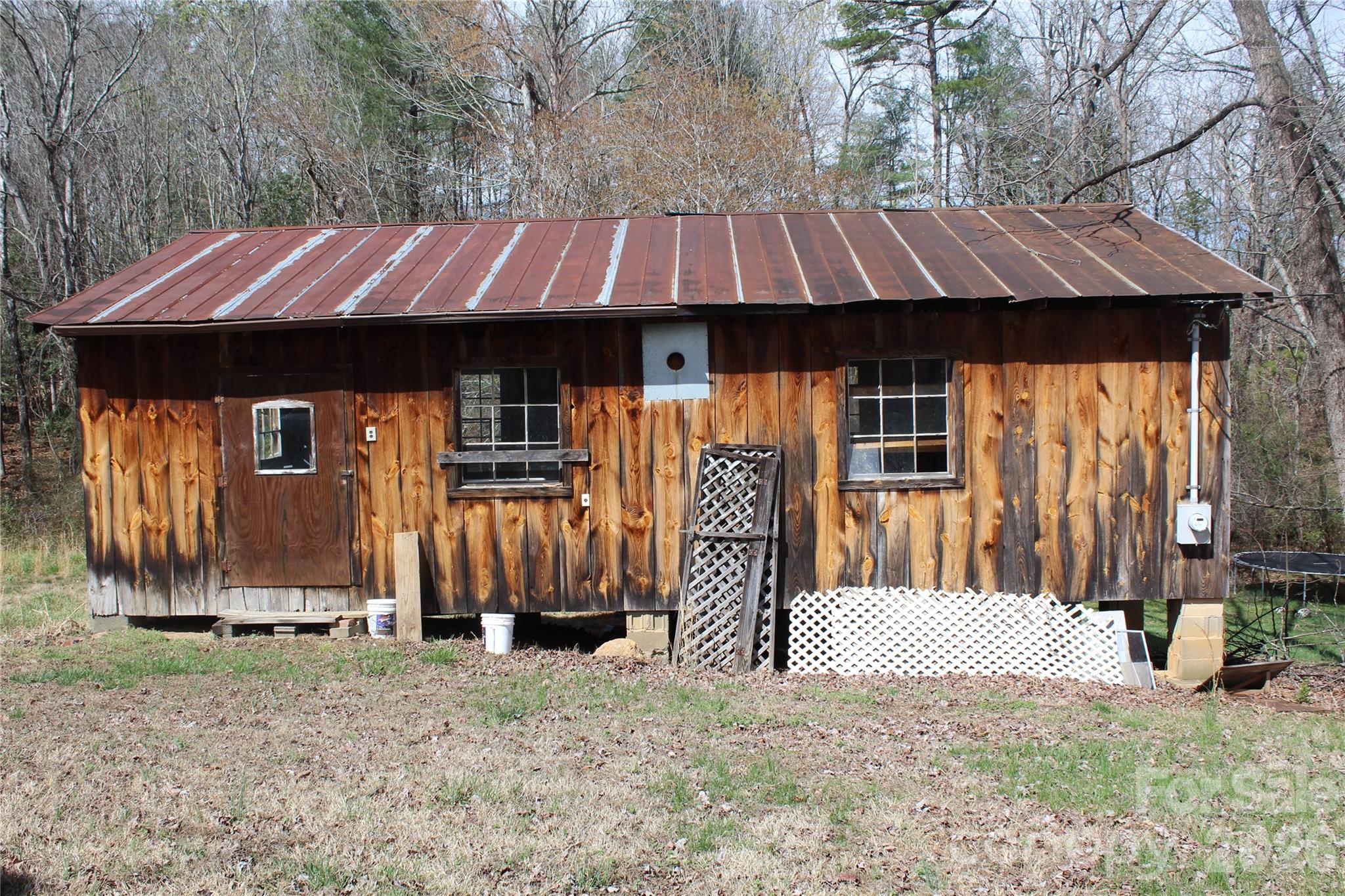 113 Williams Street Morganton, NC 28655 - Photo 19 of 20 a view of barn with wooden fence