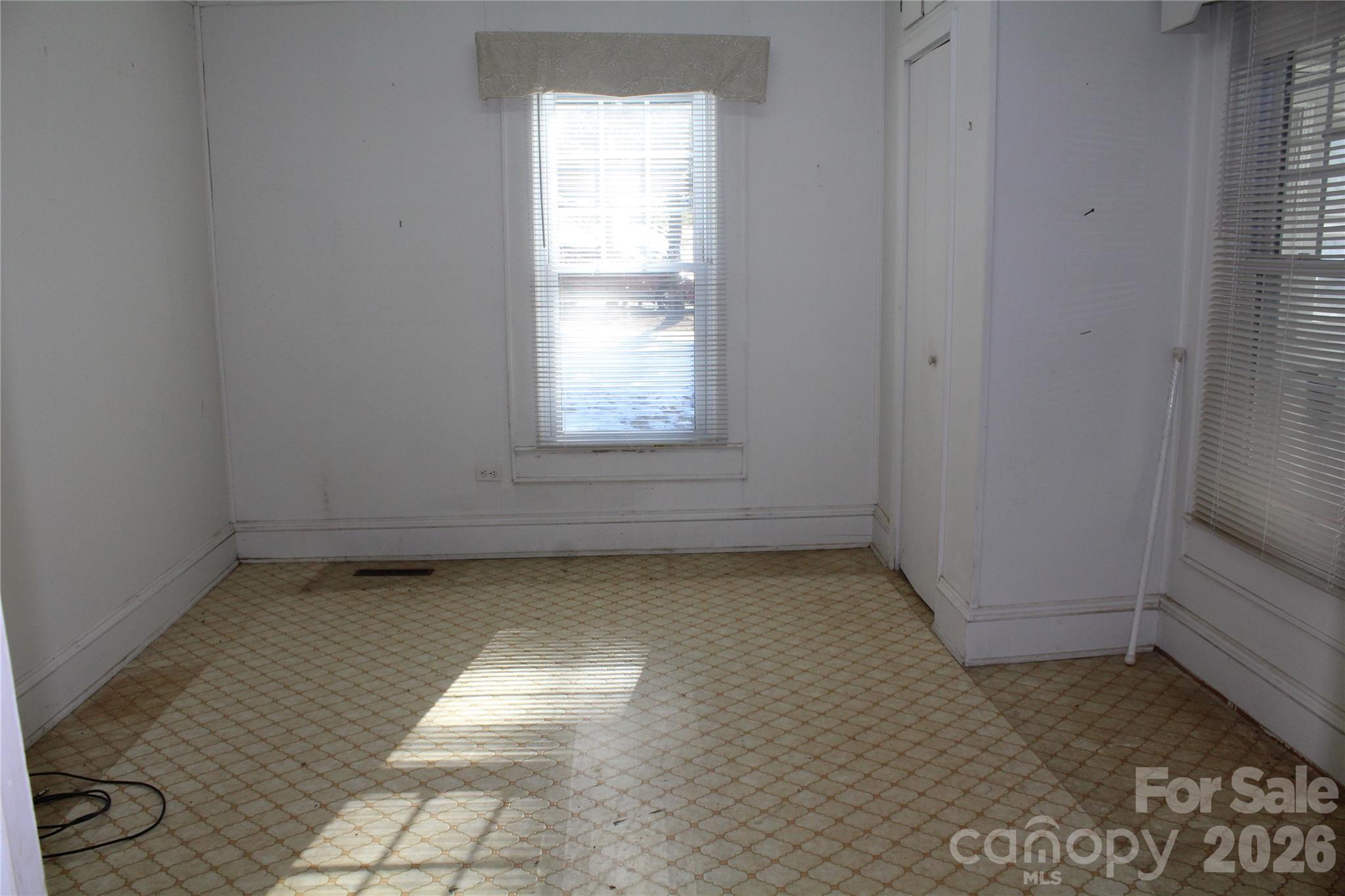 113 Williams Street Morganton, NC 28655 - Photo 9 of 20 an empty room with a window