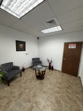 a living room with furniture and a couch