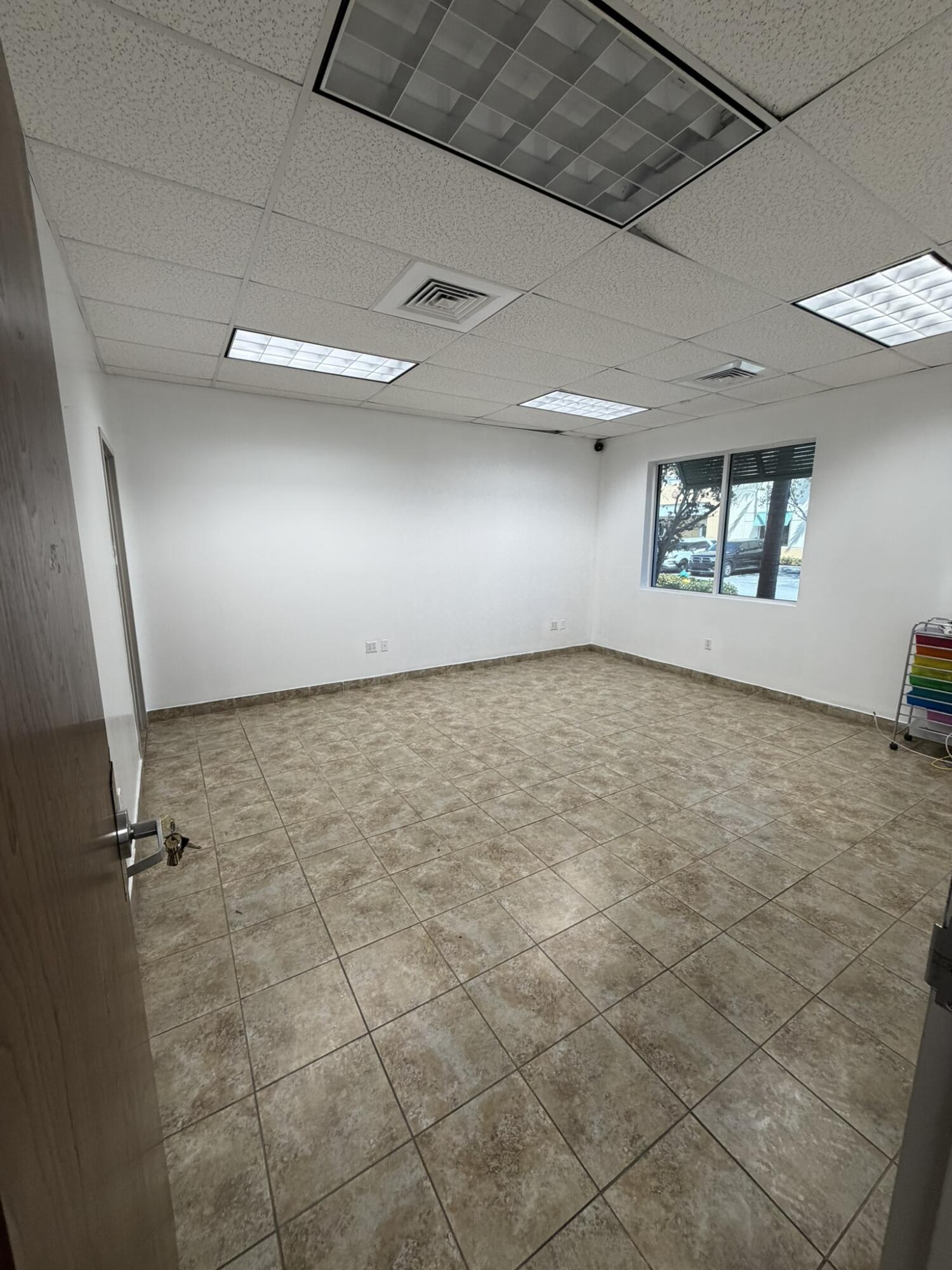 1779 Banks Road, Unit 17791781 Margate, FL 33063 - Photo 5 of 10 an empty room with windows
