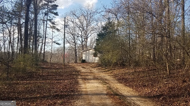 2331 Kesler Road Carnesville, GA 30521 - Photo 48 of 50 a view of a yard with trees