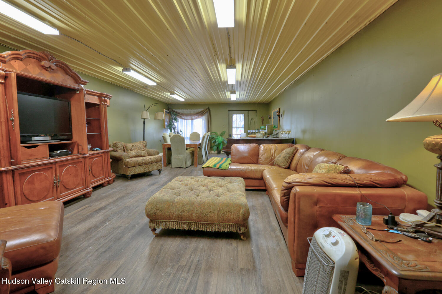 301 Sugar Loaf Road Earlton, NY 12058 - Photo 21 of 64 a living room with furniture and a flat screen tv