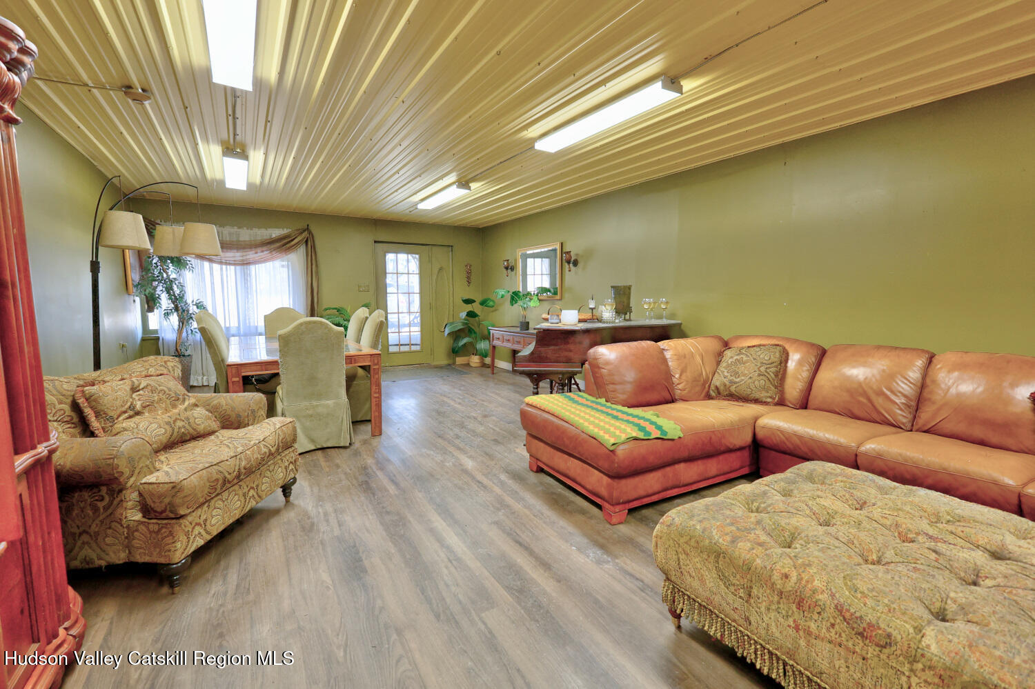 301 Sugar Loaf Road Earlton, NY 12058 - Photo 23 of 64 a living room with furniture and a large window
