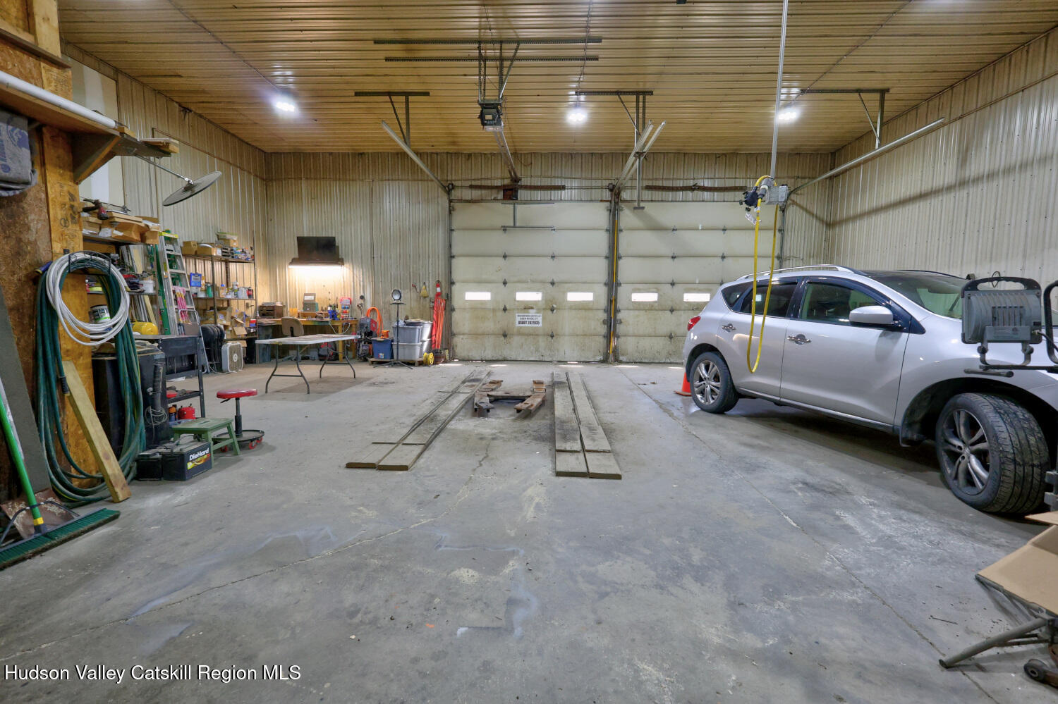 301 Sugar Loaf Road Earlton, NY 12058 - Photo 24 of 64 a view of parking garage with cars